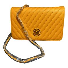 Nwt Badgley Mischka Quilted Crossbody Bag With Thin Chain Strap In Yellow. Vegan/Faux Leather. Contemporary Color With Quilted Magnetic Flip Closure. Silver Toned Chain Strap (Approximately 15” & Removable) With Material Weaving Through The Loops. Inside Has Card Slots And A Zippered Pocket. (In Original Packaging) Size Approx. 9”X6”X2.75” Material Weaving, Yellow Quilts, Quilted Crossbody Bag, Quilted Bag, Badgley Mischka, Chain Strap, Card Slots, Slots, Vegan Leather