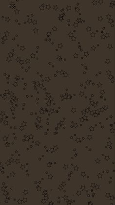 black and white stars on a brown background