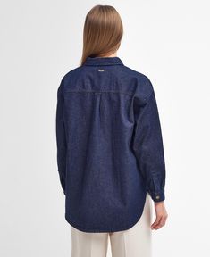 Cassie Denim Oversized Long-Sleeved Shirt The Barbour Cassie Denim Shirt puts a feminine twist on traditional tailoring with its dark denim composition. Designed with a branded button-through fastening for practicality, it's crafted to an oversized fit with a dropped back hem for a relaxed and laid-back look. Denim Shirt Women, Dark Denim Shirt, Oversized Denim Shirt, Baby Boy Tops, Womens Denim Shirt, One Piece Outfit, Fleece Sweater, Fleece Pants, Sweaters Knitwear