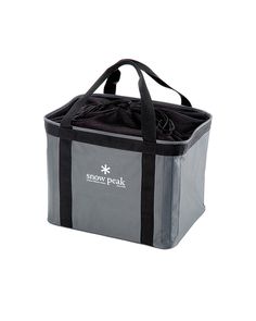 a gray and black cooler bag with the words snow peak on it's side