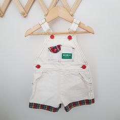 Amazing rainbow tartan trim denim vintage Oshkosh shortall overalls hanging on wooden accordion rack Vintage Rainbow, Tartan