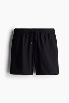 Regular-fit shorts in woven cotton fabric. Drawstring waistband with covered elastic and mock fly. Side pockets and a welt back pocket. Casual Cotton Swim Trunks With Built-in Shorts, Cotton Swim Trunks With Built-in Shorts, Casual Cotton Swim Trunks With Side Pockets, Cotton Swim Trunks With Pockets, Bermuda Cotton Swim Trunks With Pockets, Casual Cotton Swim Trunks With Elastic Waistband, Casual Cotton Swim Trunks With Pockets, Black Cotton Swim Trunks With Pockets, Cotton Swim Trunks Short Length