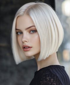 Add texture to your platinum blonde bob with a blunt cut for a more voluminous and lively style. The textured layers give the blunt bob a playful and dynamic appearance, making it ideal for everyday wear. White Blonde Bob With Bangs, Platinum Blonde Bob, White Blonde Bob, Platinum Blonde Hair Color Ideas, Blonde Transformation, Platinum Blonde Bobs, Platinum Blonde Hair Color, Subtle Balayage, Textured Layers