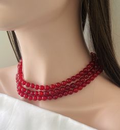 Gorgeous 3 Strand Red Jade Necklace Top Quality translucent  Stones Silver Colored Alloy Snap Lock closure  Knotted between each Stone  Special Occasion Necklace . Stunning/Trendy/Unique/stylish Wear. Complements most color outfits  Green Jade : 8-9 mm Necklace Length : 17 -20 inches Red Pearl Necklace With Gemstone Beads, Elegant Red Choker With Round Beads, Elegant Beaded Necklaces For Valentine's Day, Red Single Strand Necklace For Wedding, Valentine's Day Elegant Beaded Necklaces, Red 8mm Beaded Jewelry For Valentine's Day, Red Pearl Necklace With Polished Round Beads, Red Round Choker As A Gift, Red Round Choker As Gift