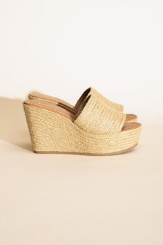 Elevate your footwear game with SODA’s Bounty Wedge Platform Heels. These heels boast a chic design crafted from synthetic raffia, blending texture and style seamlessly. With a comfortable wedge platform, these heels are a versatile choice for adding both height and sophistication to your outfits, making them perfect for a range of occasions.PRODUCT SPECIFICATIONS:*Open Round Toe*Heel height: 4 inches*Heel shape: Wedge*Brand: SODA*Online Only Summer Sandals Heels, Hoco Ideas, Pinning Ceremony, Beige Wedges, Comfortable Wedges, China Style, Platform Wedge Heels, Bridesmaid Shoes, Espadrille Wedge