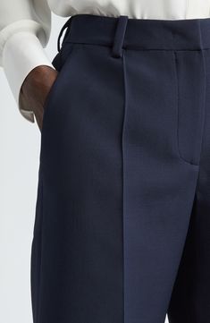 Keep your warm-weather look polished in these Bermuda shorts impeccably tailored from the label's signature crepe couture fabric woven from wool and silk. 11" inseam; 22" leg opening; 10" front rise; 12" back rise (size 40 IT) 65% virgin wool, 35% silk Dry clean Made in Italy Designer Clothing Tailored Elegant Shorts, Classic Semi-formal Short Bottoms, Chic Tailored Structured Bottoms, Elegant Tailored Shorts, Classic Tailored Structured Bottoms, Tailored Formal Shorts, Classic Tailored Shorts For Business Casual, Formal Structured Classic Bottoms, Classic Formal Shorts For Spring