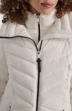 A water-resistant coating ensures you can safely brave the elements in this hooded puffer jacket that easily packs away when not in use. Front zip closure Stand collar; drawcord hood Long sleeves Front zip pockets Lined, with recycled textile and synthetic fill 100% polyester Machine wash, tumble dry Imported Hooded Puffer Jacket, Nordstrom Store, Puffer Jacket, Stand Collar, Nordstrom Rack, Brave, Zip Pockets, Puffer, Water Resistant