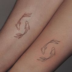 two koi fish tattoo designs on both arms