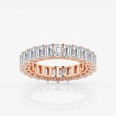 a rose gold ring with baguets and diamonds