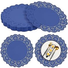 three blue doily plates with gold forks and spoons