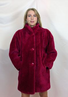 Gorgeous true vintage 1990s faux fur fluffy coat. Staff pick! The colours on this one are everything. Deep beetroot pink/red with contrasting purple bits. Entirely synthetic, but this is not appalling quality of contemporary faux fur garments. It won't bobble, it won't change shape. Fully lined with matching red lining. Funny large round plastic buttons, all intact. Power shoulders typical for the early 90s. This teddy coat is chunky, but lightweight, super comfortable and so much fun to style. Cozy Burgundy Winter Outerwear, Purple Fur Coat For Fall, Purple Faux Fur Winter Outerwear, Purple Faux Fur Outerwear For Winter, Purple Faux Fur Coat For Winter, Winter Purple Faux Fur Outerwear, Winter Purple Faux Fur Coat, Tout Rose, Fluffy Coat