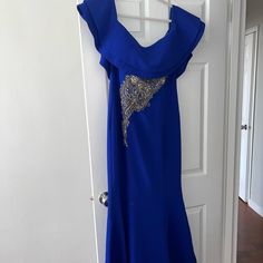 Beautiful Royal Blue Off The Shoulder Maxi Dress. Has Been Worn Once Only!! Fits Like The Glove!! Elegant Royal Blue Mother Of The Bride Evening Dress, Royal Blue Evening Dress For Mother Of The Bride, Glamorous Blue Floor-length Mother Of The Bride Dress, Royal Blue Royal Style Gown For Evening, Blue Floor-length Evening Dress For Mother Of The Bride, Sleeveless Blue Mother Of The Bride Dress For Evening, Sleeveless Blue Evening Dress For Mother Of The Bride, Evening Blue Floor-length Mother Of The Bride Dress, Evening Mother Of The Bride Floor-length Blue Dress