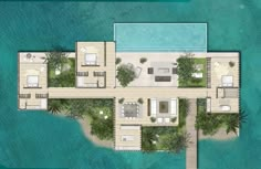 an aerial view of a house on the water with several pools and lounges around it