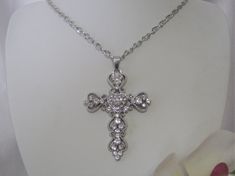 "Silver tone Cross setting enhance with Rhinestones, heart design in the center, cross measures 3\" down by 2\" across, necklaces measure 27\" long with a lobster claw closure." Chain Accessories, Pepsi Cola, Star Chain, Rhinestone Cross, Funky Jewelry, Fancy Jewelry, Cross Jewelry, Girly Jewelry, Adjustable Necklace