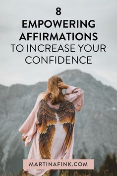 a woman standing on top of a mountain with the text 8 empoering affirmations to increase your confidence