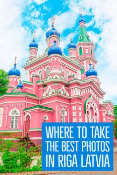 there is a pink building with blue domes on it and the words where to take the best photos in riga lavria