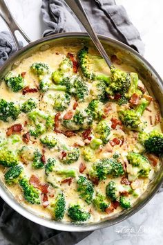 a pan filled with broccoli and cheese on top of a table