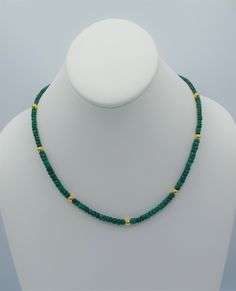 - Graduated Emerald Necklace with gold beads - Faceted Emerald beads; approx. 3-5mm - Gold-filled bead stations, 3-5mm - 14-karat yellow gold-filled hardware - Lobster clasp - Approx. 16-18"L - Made in the USA Gold Emerald Necklace With Rondelle Gemstone Beads, Gold Single Strand Emerald Necklace As Gift, Gold Single Strand Emerald Necklace Gift, Gold Emerald Necklace With Round Beads Single Strand, Gold Emerald Necklace With Round Beads, Elegant Gold Emerald Necklace With Polished Beads, Elegant Gold Emerald Necklace With Faceted Beads, Gold Rondelle Beaded Necklaces With Gemstone Beads, Gold Rondelle Gemstone Beaded Necklace