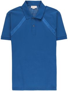 logo-tape jersey polo shirt from Alexander McQueen featuring ocean blue, jersey knit, logo-tape detailing, polo collar, front button placket, short sleeves and straight hem. Luxury Blue Collared Polo Shirt, Designer Blue Cotton Polo Shirt, Blue Sporty Polo Shirt With Ribbed Collar, Luxury Blue Polo Collar Top, Modern Blue Collared Polo Shirt, Alexander Mcqueen Logo, Knit Logo, Blue Jersey, Stone Texture