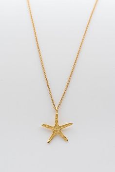 14k gold  Starfish pendant hangs on a fine 14k gold woven chain. ALL 14K SOLID GOLD !Dainty and classic must-have, effortlessly chic, perfect by itself or layered with other necklaces for a total boho-chic look. ►Material:♦ 14K Yellow GOLD - NOT plated or gold filled!!!►Measurements:♦ Necklace length: 45 cm (17.71")♦ Necklace width: 0.039" inch (1 mm)♦ Pendant: 13 mm (0.5 ") diameter____________________________________________________________♥ Everything in my shop is handmade by me with lots of Gold Starfish Necklace With Lobster Clasp, Yellow Gold Starfish Necklace As Gift, Yellow Gold Star Necklaces With Starfish Charm, 14k Gold Starfish Charm Jewelry For Gifts, 14k Gold Starfish-shaped Jewelry, 14k Gold Jewelry With Starfish Charm For Gift, Gold Nautical Jewelry With Star Charm, Gold Necklace With Starfish Charm For Gift, Gold Starfish Charm Jewelry In 14k Gold