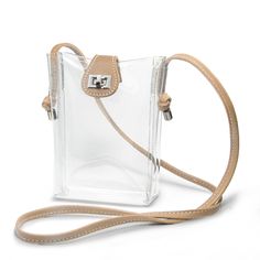 PRICES MAY VARY. Compact and Stylish Clear PVC Cross Body Bag,Small size and a lightly structured design won't weigh you down at game day or fashion concert. This lightweight Clear Shoulder Bag features a turn lock closure for easy access and keep your everyday essentials,Approved to be used where regulations require clear bags.The cool see-through purse made with durable PVC(1.1mm thick)and the Vegan leather trim that add stylish style. Carefully designed and sized at 5.5”L x 6.7”H x 3.5''W inc Clear Purses, Structured Design, Cross Body Bags, Clear Bags, Fire Pits, Everyday Essentials, Cross Body Bag, Phone Bag, Leather Trim