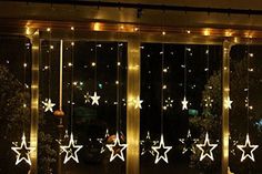 the window is decorated with stars and lights