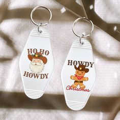 two key chains with cartoon characters on them