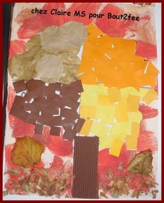 an art project made out of paper with leaves and other things on the bottom half