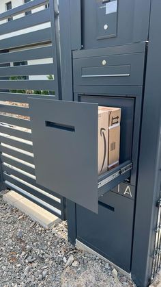 a metal gate that has some boxes in it