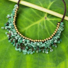 Make a grand entrance with this stylish beaded necklace from Tiraphan Hasub in Thailand. The dramatic cord necklace features myriad enhanced green aventurine chips knotted together, topped with shiny brass beads for contrast. The necklace fastens with a toggle crafted of cool aventurine nuggets. Bead Top, Jewels Diy, Unique Gifts For Mom, Buy Bead, Popular Jewelry, Celtic Jewelry, New Energy, Global Style, Cord Necklace