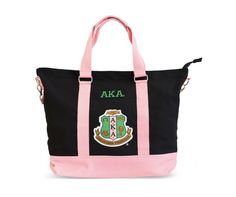 Presenting the AKA Canvas Tote Bag, a perfect blend of functionality and AKA pride. Crafted with durable canvas material, this tote bag showcases the iconic AKA letters in vibrant pink against a classic white backdrop. With ample space and sturdy handles, it's not only a stylish accessory but also a reliable companion for everyday errands, beach days, or AKA events. Whether you're headed to a sorority meeting or a casual outing, let the AKA Canvas Tote Bag be your go-to choice, reflecting your d Aka Apparel, Aka Sorority Gifts, Aka Sorority, Sorority Canvas, Alpha Kappa Alpha Sorority, Oversized Bag, Alpha Kappa Alpha, Sorority Gifts, Black Canvas