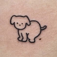 a small elephant tattoo on the stomach