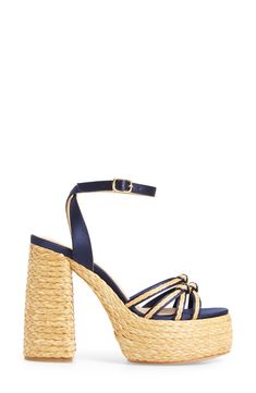 Soft indigo satin and braided raffia distinguish this elegant platform sandal with knotted vamp straps and a nonslip sole. 5 heel, 2" platform (size 39) Adjustable ankle strap with buckle closure Textile and raffia upper/leather lining/leather and synthetic sole Made in Spain Designer Shoes Chic Straw Sandals For Party, Chic Party Sandals With Straw Material, Straw Ankle Strap Sandals For Party, Chic Ankle Strap Straw Heels, Ankle Strap Straw Sandals For Party, Straw Ankle Strap Heels For Party, Straw Block Heel Sandals For Party, Party Sandals With Ankle Strap In Straw, Party Ankle Strap Straw Sandals