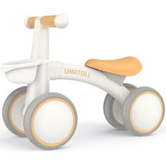 an image of a toy bike that is white and yellow