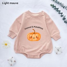 👼Pick a soft and comfortable Mama's Pumpkin romper for your little one! 🎃Celebrate your little one's first fall in this adorable 'Mama's Pumpkin' romper! This cozy, soft outfit is perfect for autumn adventures and makes a great gift for your little pumpkin. 💕The fabric of the clothing is cotton, very skin-friendly, and excellently crafted. ✔️ Ordering Instructions 1 - Please refer to the size chart images provided in the listing for details on available sizes, styles, and colors. 2 - Choose y Long Sleeve Cotton Onesie For Halloween, Halloween Long Sleeve Onesie For Playtime, Fall Long Sleeve Onesie With Letter Print, Fall Long Sleeve Letter Print Onesie, Cute Halloween Onesie For Playtime, Playful Long Sleeve Onesie With Letter Print, Cute Long Sleeve Onesie With Graphic Print, Playful Halloween Onesie With Cartoon Print, Cute Cotton Halloween Onesie