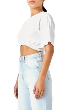 Top your high-waist styles with this staple cropped T-shirt crafted from pure cotton with a stretch elastic hem. Crewneck Short sleeves Lined 100% cotton with 93% polyester, 7% spandex contrast Hand wash, dry flat Imported Cotton Cropped Hem T-shirt For Summer, Relaxed Fit Cotton Tops With Cropped Hem, Relaxed Fit Cotton Top With Cropped Hem, Relaxed Fit Cropped Cotton Tops, Summer Cotton Cropped Hem T-shirt, Cropped Hem Cotton Tops With Relaxed Fit, White Stretch Cropped Shirt Casual Style, White Cotton Cropped Hem Top, White Cropped Cotton Top