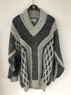 "Very warm men's patterned jumper in several shades of grey. It has a V-neck with flaps and a fold-over collar. The yarns are very warm with a fluffy finish.  Material: no composition of the sweater, it seems to be mohair wool. Size: the jumper seems to be best suited for those wearing size L - Large.. Also check out the measurements below: Shoulder: 59.5 cm - 23.42 inches Armpit to armpit 57 cm - 22.44 inches Total length 78 cm - 30.70\" Sleeve length from armpit: 53 cm - 20.86\" CONDITION: Very good vintage condition.  All measurements are taken with the garment lying flat. Due to lighting, the color of the product may be slightly different from the photos. Follow our store for new exclusive vintage clothing that's just for YOU! SHIPPING * I ship worldwide via Priority mail (Lietuvos Paš Patterned Jumper, Mohair Wool, Knitwear Men, Wool Cardigan, Shades Of Grey, Pullover Sweater, Vintage Men, Norway, Pullover Sweaters