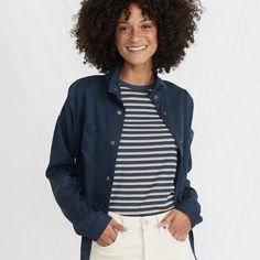 Meet Your New Best Friend. Cropped At The Hip, Slightly Boxy Fit, Ties At The Bottom, Snaps Up The Front, And Plays Nicely With Everything In Your Closet. Featuring 100% Tencel Lyocell That's Been Sand-Washed Down For Extra Softness. Marine Layer Uses It For Its Flattering Drape, Softness, Durability, And Low-Maintenance. Black Iris 100% Tencel Lyocell Cropped Body With A Tie In Front Snaps Up The Front Sand-Washed For Softness Standard Fit Wash Cold, Dry Low Spring Button-up Shacket For Layering, Navy Casual Button-up Utility Jacket, Casual Spring Shacket For Layering, Casual Blue Utility Jacket With Relaxed Fit, Navy Button-up Utility Jacket For Work, Versatile Long Sleeve Utility Jacket, Blue Relaxed Fit Shacket For Everyday, Blue Long Sleeve Shacket For Everyday, Casual Navy Outerwear For Layering