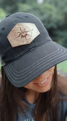 This custom Richardson hat has the bear compass etched into the leather patch. It is a great hat for anyone who loves and appreciates the beautiful country nights. This is a one size fits most, adjustable snap back Richardson original 111 snapback hat in Black and Grey. .:DETAILS:. -QTY 1 - Snap back Richardson Curved bill Hat .:HOW TO ORDER:. -Add the item to you cart. -Leave notes in the notes to seller section if changes are needed. Thank you! I make items to REPRESENT YOUR LIFE and who you a Adjustable Brown Hat For Hiking, Casual Baseball Cap For Outdoor Work, Casual Black Hats For Outdoor Work, Outdoor Trucker Hat With Visor, Trucker Hat With Visor For Outdoor Activities, Trucker Visor Hat For Outdoor Activities, Outdoor Trucker Dad Hat With Curved Brim, Trucker Style Brown Baseball Cap For Camping, Brown Trucker Baseball Cap For Camping