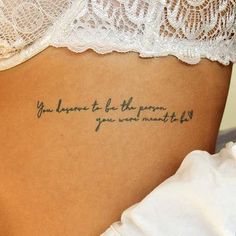 a woman's back with the words you have to be the person you want to be written on it