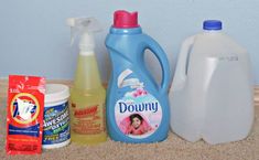 several cleaning products are sitting on the counter