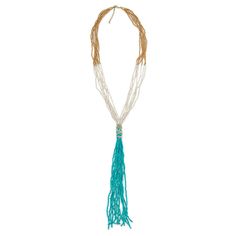 Embrace the vibrant charm of the Sachi Island Waterfalls Necklace with its stunning long turquoise tassel. This piece from our Sachi collection perfectly blends contemporary style with artisanal craftsmanship.This trendy necklace is perfect for adding a splash of color to any outfit. Wear it to elevate your casual look or pair it with a dress for a chic, bohemian vibe. Design: Long turquoise tassel for a bold statement Length: 26″ with a 2″ extension and an 8″ drop Turquoise Bohemian Tassel Necklace, Bohemian Tassel Necklace With Dangling Beads For Beach, Bohemian Lariat Necklace With Tassels For Gifts, Bohemian Lariat Necklace With Tassels As Gift, Bohemian Beach Tassel Necklace With Fringe, Bohemian Beaded Lariat Necklace With Tassels, Bohemian Lariat Beaded Necklace With Tassels, Turquoise Tassel Necklace For Beach, Turquoise Beaded Tassel Necklace Gift