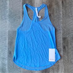 Nwt!! Blue Lightweight Casual Activewear, Casual Lightweight Blue Activewear, Blue Casual Activewear With Mesh Back, Casual Blue Activewear With Mesh Back, Teal Tank Top, Lululemon Align Tank, Red Trench Coat, Orange Tank Top, Lululemon Tops