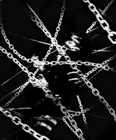 black and white photograph of chain links