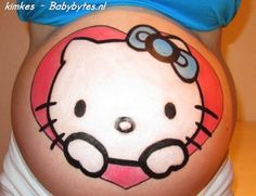 a pregnant belly with hello kitty painted on it's side and an eye patch