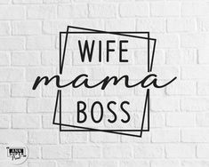 a white brick wall with the words wife mama boss in black ink on it's side