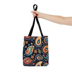 Discover the perfect blend of practicality and high-quality craftsmanship with our versatile Tote Bag, available in three convenient sizes. Whether you're heading to the beach or exploring the town, this bag combines comfort and style seamlessly with its eye-catching all-over print. Crafted from durable materials, it ensures long-lasting use, accompanying you through multiple seasons. Embrace the reliability and timeless appeal of our Tote Bag, designed to elevate your everyday adventures with e Everyday Use Bags With Paisley Print, Multicolor Rectangular Bag With Paisley Print, Everyday Adventures, Paisley Pattern, Medium Bags, Large Bags, Small Bags, Black Cotton, Your Style