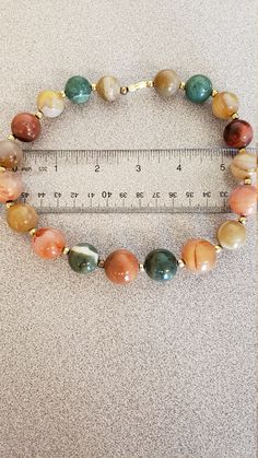 "Vintage heavy agate necklace measuring 16 1/2\" long with marble like agates. Clasp is screw on. See photos." Marble Colored Agate Jewelry With Natural Stones, Marble Agate Jewelry, Agate Necklace, Beaded Necklaces, Necklace Etsy, Screw, Agate, Beaded Necklace, Marble