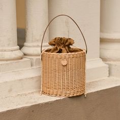 Handmade wicker basket with leather handle. Size: Diameter: 20 cm Height: 20 cm Chic Picnic Bags With Braided Handles, Chic Brown Bag For Picnic, Bohemian Top Handle Bucket Bag For Summer, Beige Bucket Bag For Picnic, Brown Summer Picnic Bag, Brown Summer Bags For Picnic, Brown Bags For Summer Picnic, Brown Bag For Summer Picnic, Beige Top Handle Straw Bag For Day Out