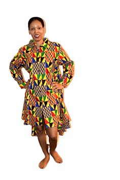 Print Swing Tunic 1 piece Tunic Colors: Black/White, Green/Pink, Kente, Orange, Pink/Green, Red, Red Multi, Red/White, Royal, Turquoise, Yellow Sizes: One Size (Fit up to size 3X) Multicolor Fitted Knee-length Shirt Dress, Fitted Multicolor Long Sleeve Shirt Dress, Yellow Fitted Long Sleeve Shirt Dress, Fitted Yellow Long Sleeve Shirt Dress, Fitted Long Sleeve Yellow Shirt Dress, Fitted Multicolor Printed Shirt Dress, Pink Kente, Camouflage Green, Orange Pink